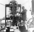 Vern Estes working to complete Mabel, the engine-making machine, in 1958